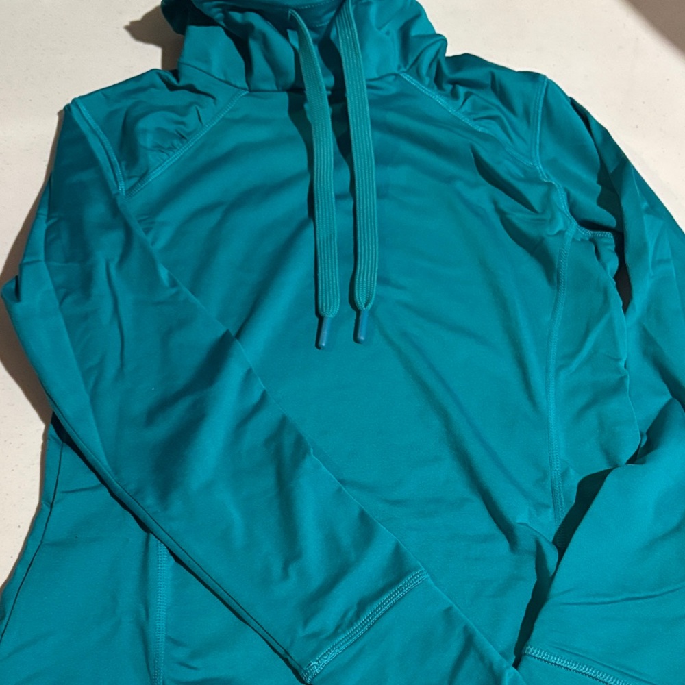 Women’s Layer8 performance medium Qwick-dry mock neck shirt.